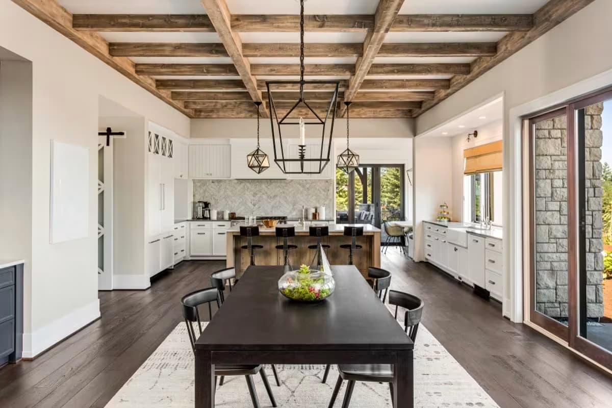 A beautifully renovated modern living room with high ceilings.
